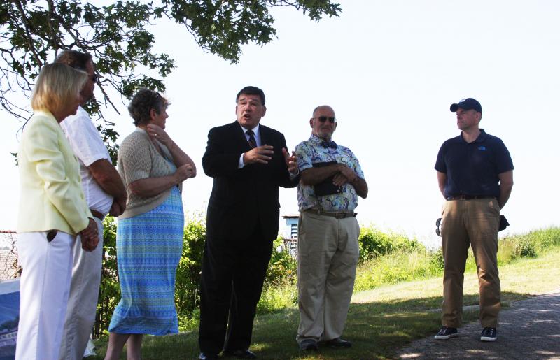 State and town officials praise the Buzzards Bay Coalition's plan to build the Onset Bay Discovery Center. On Monday, the town and coalition inked a lease agreement. From left: State Rep. Susan Williams Gifford, Selectmen Chair Peter Teitelbaum, Selectman Judith Whiteside, State Sen. Marc Pacheco (D-Taunton), Selectman Alan Slavin and Buzzards Bay Coalition President Mark Rasmussen. BY MATTHEW BERNAT